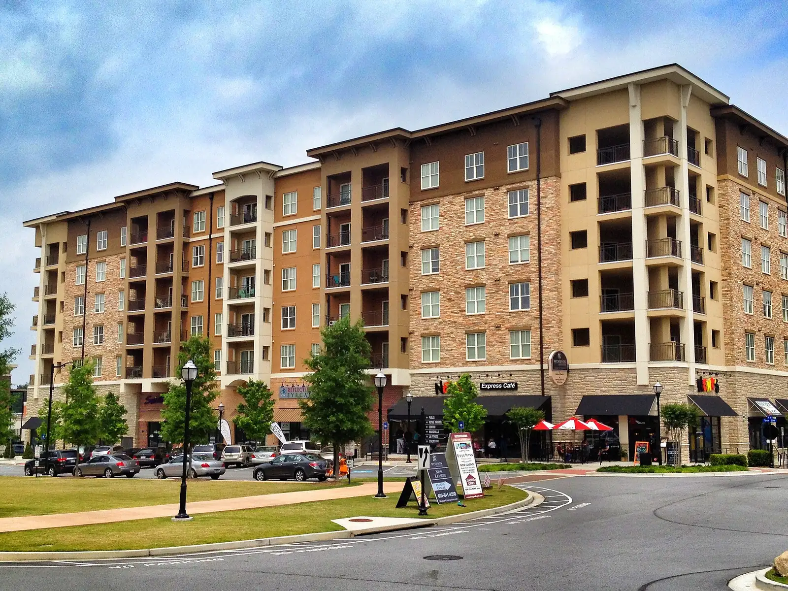 Shops and apartments around the green at Town Brookhaven on Peachtree Road