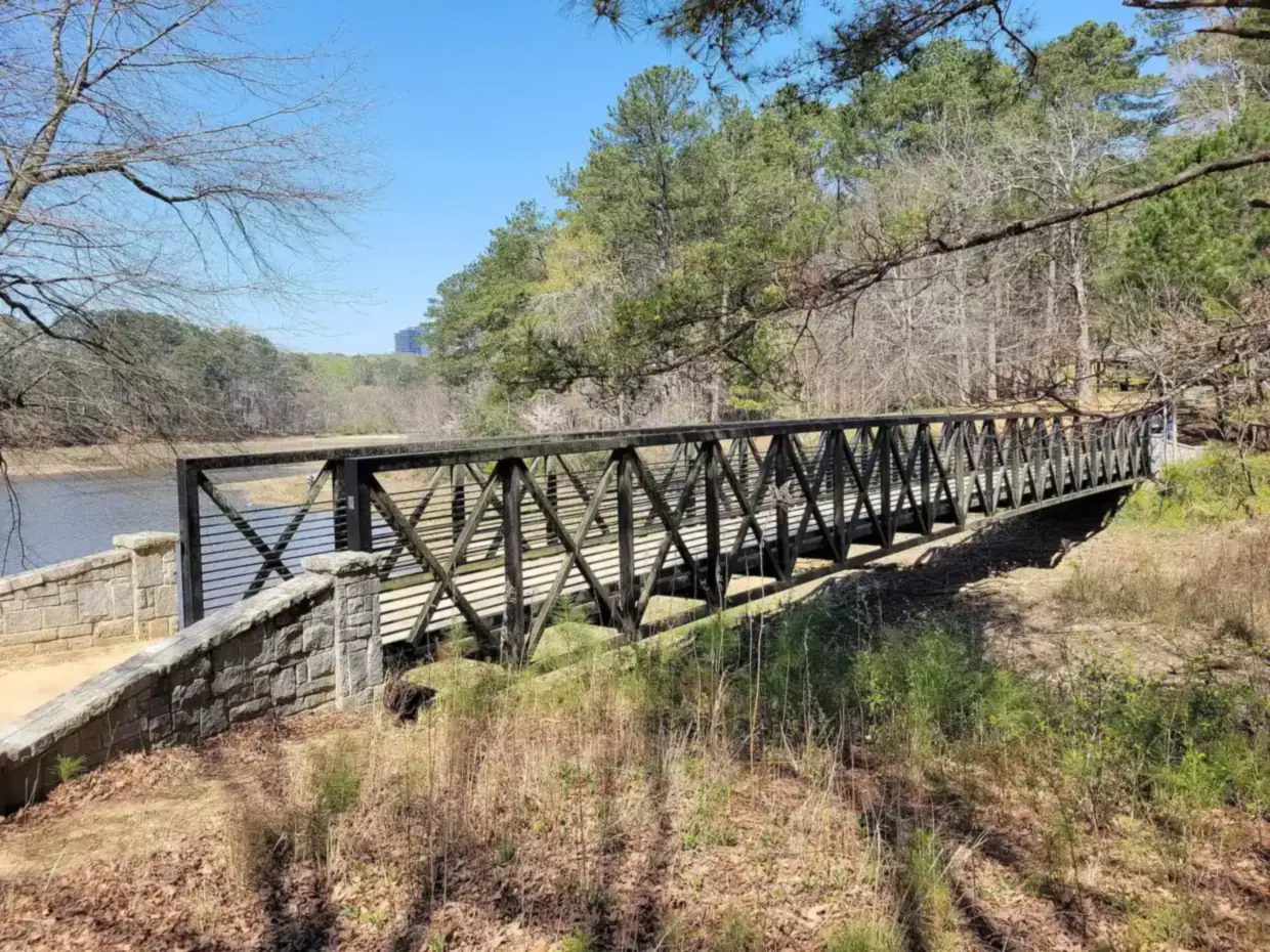 A footbridge on the trail through Murphey Candler Park, where leashed dogs can walk the lake path