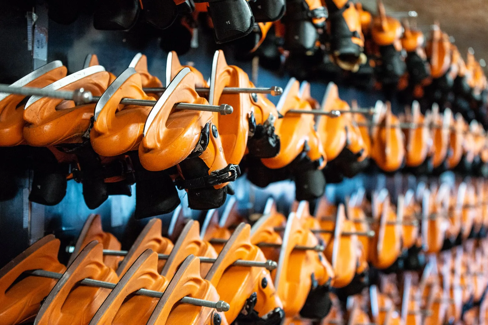 Rows of rental ice skates at a skating rink