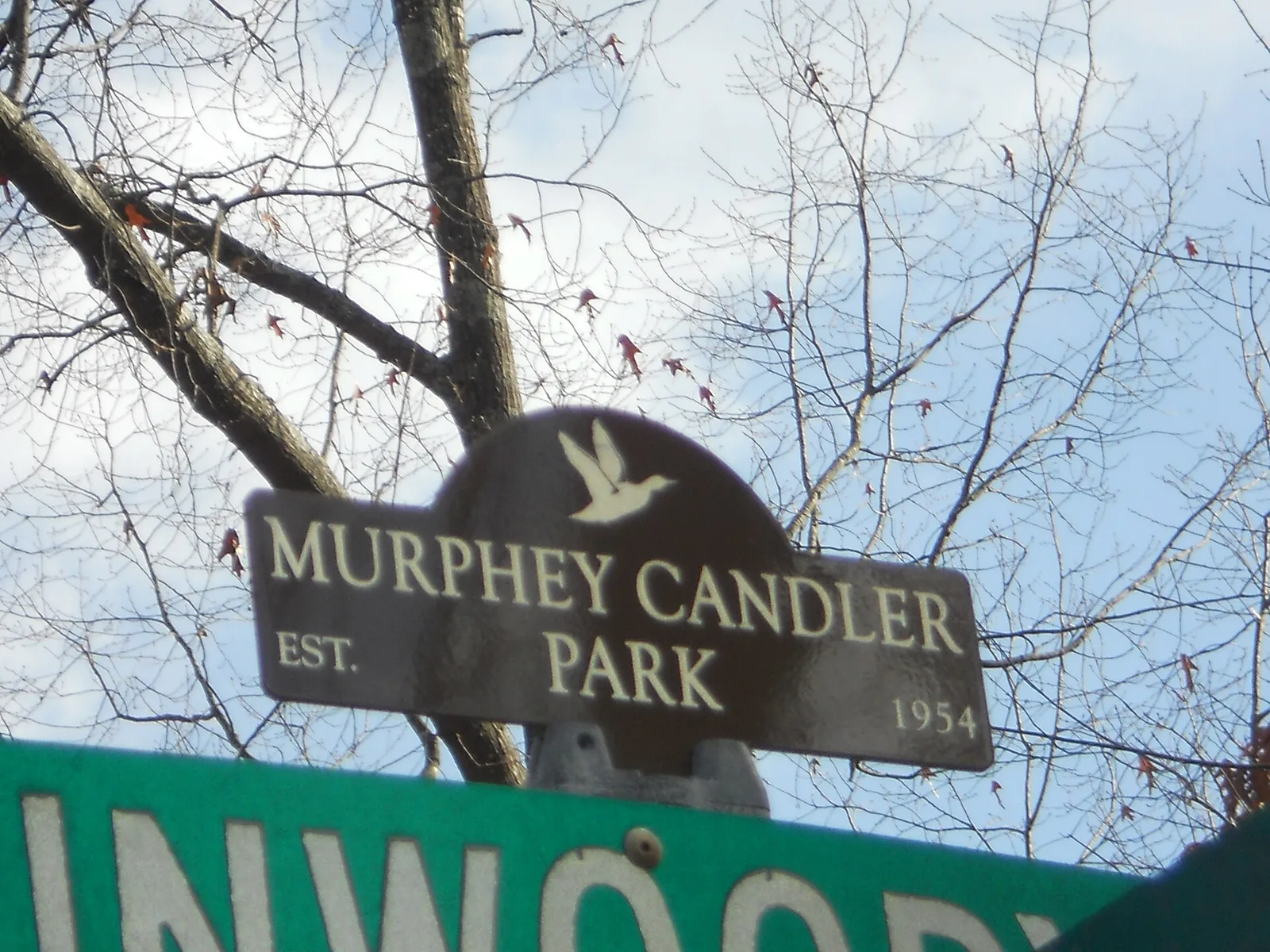 The stone entrance sign at Murphey Candler Park on West Nancy Creek Drive