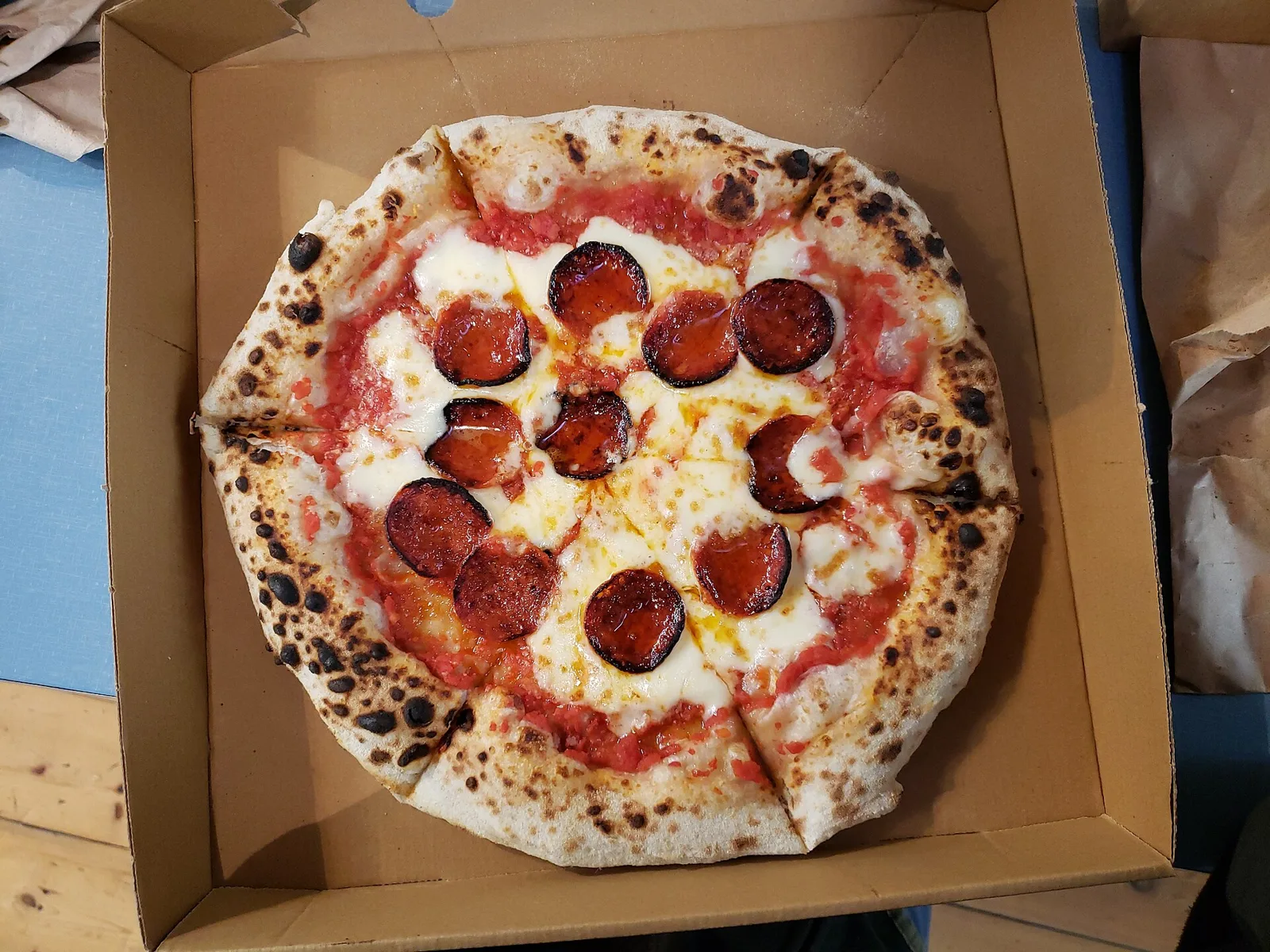 A pepperoni pizza with basil. The photo was not taken at a Brookhaven restaurant.